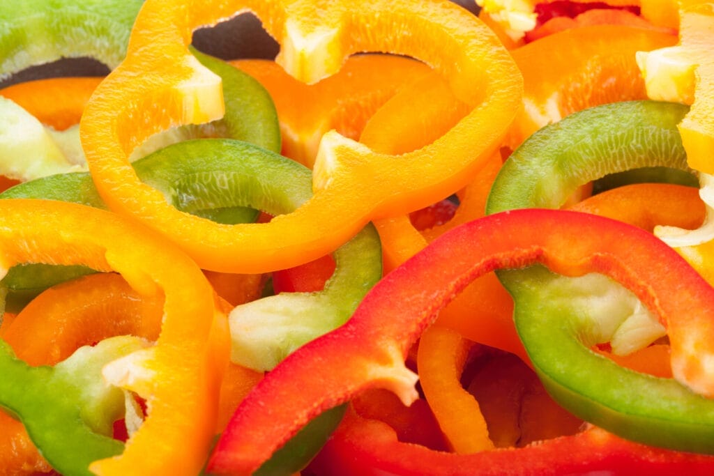 Red, orange, yellow, and green bell pepper slices.
